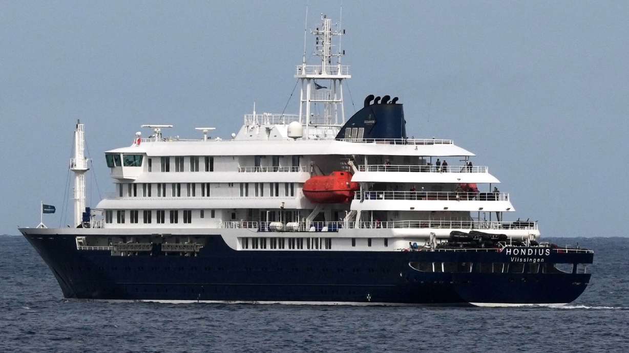 The MV Hondius cruise ship departs the port in Praia, Cape Verde, Wednesday, May 6, 2026.