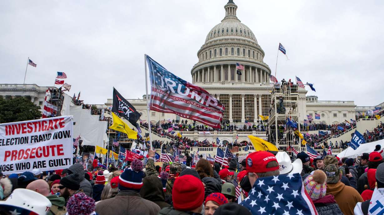 Trump reconsidering $1.8 billion fund, AP source says, as Justice Department temporarily pauses it