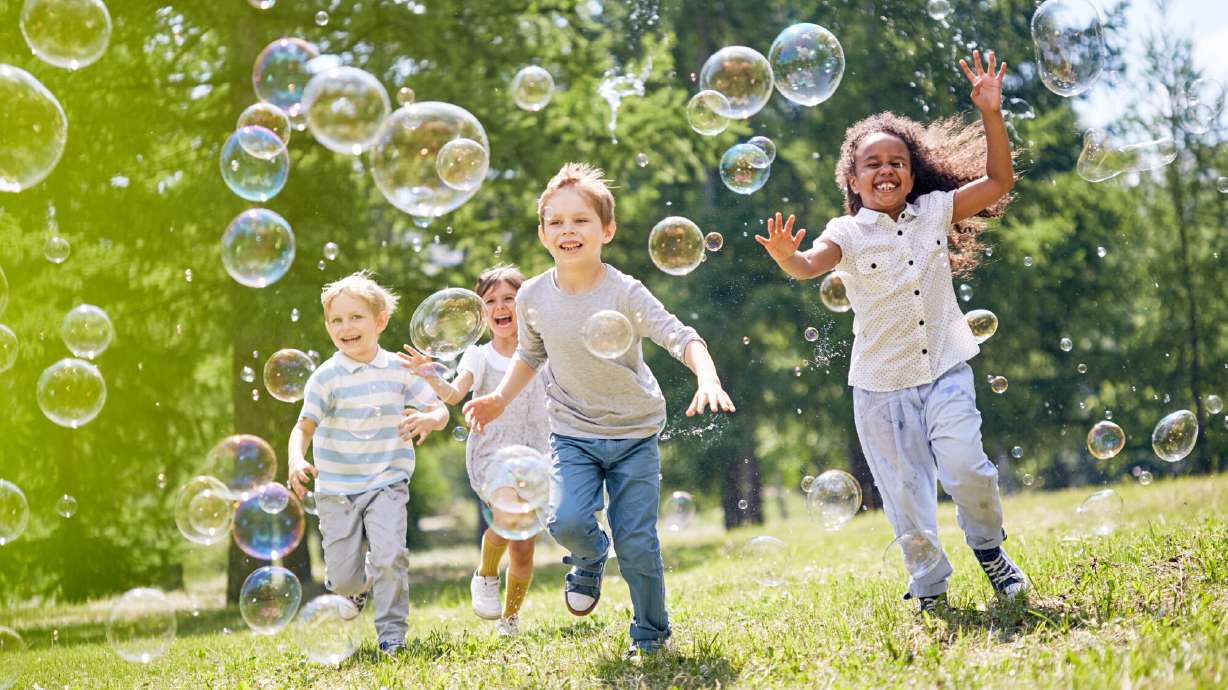 Little kids having fun outdoors
