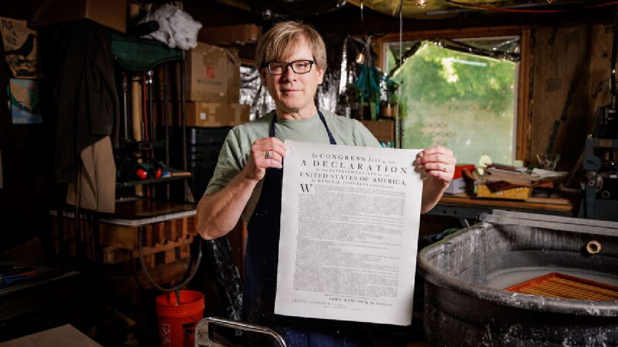 BYU adjunct professor Robert Buchert poses with his recreated Declaration of Independence.