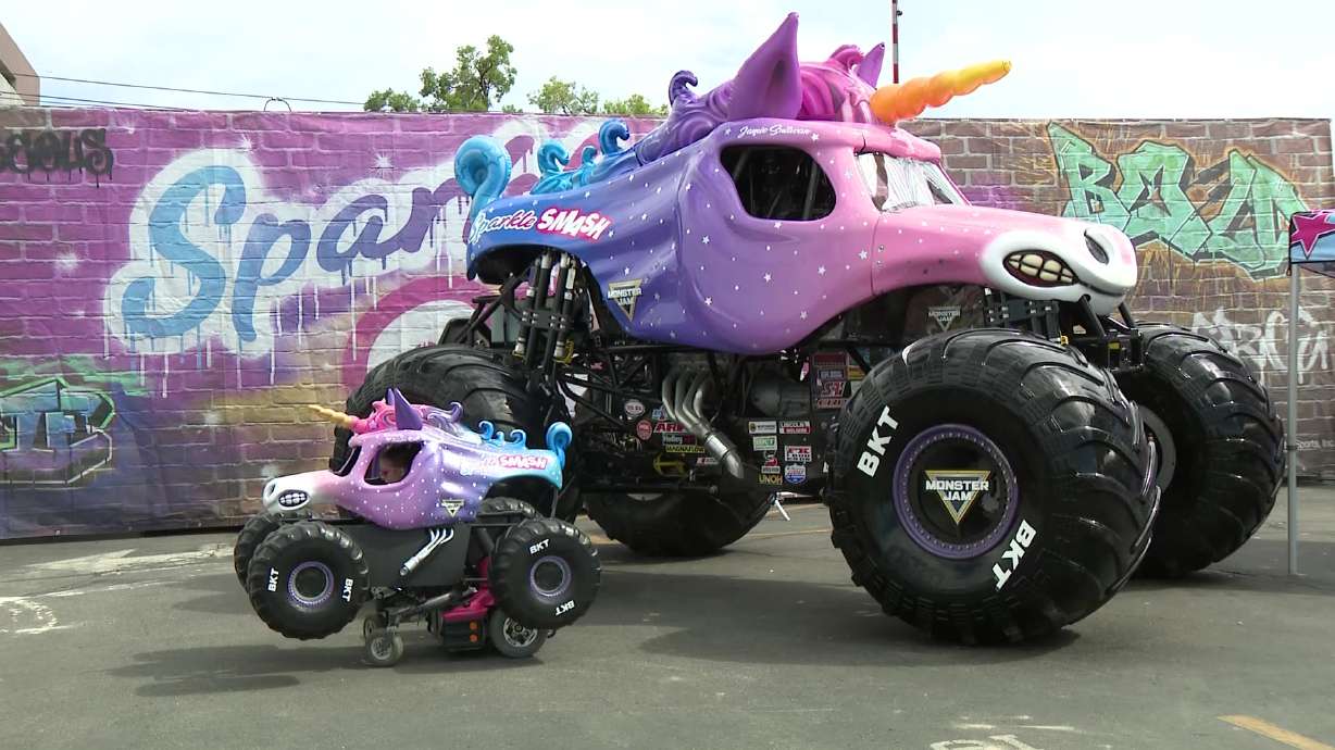 Kennedy Marples' custom Sparkle Smash wheelchair costume is pictured next to the full-size Sparkle Smash monster truck on Wednesday. With the Monster Jam World Finals rolling into town this weekend, the 9‑year‑old superfan received a surprise.