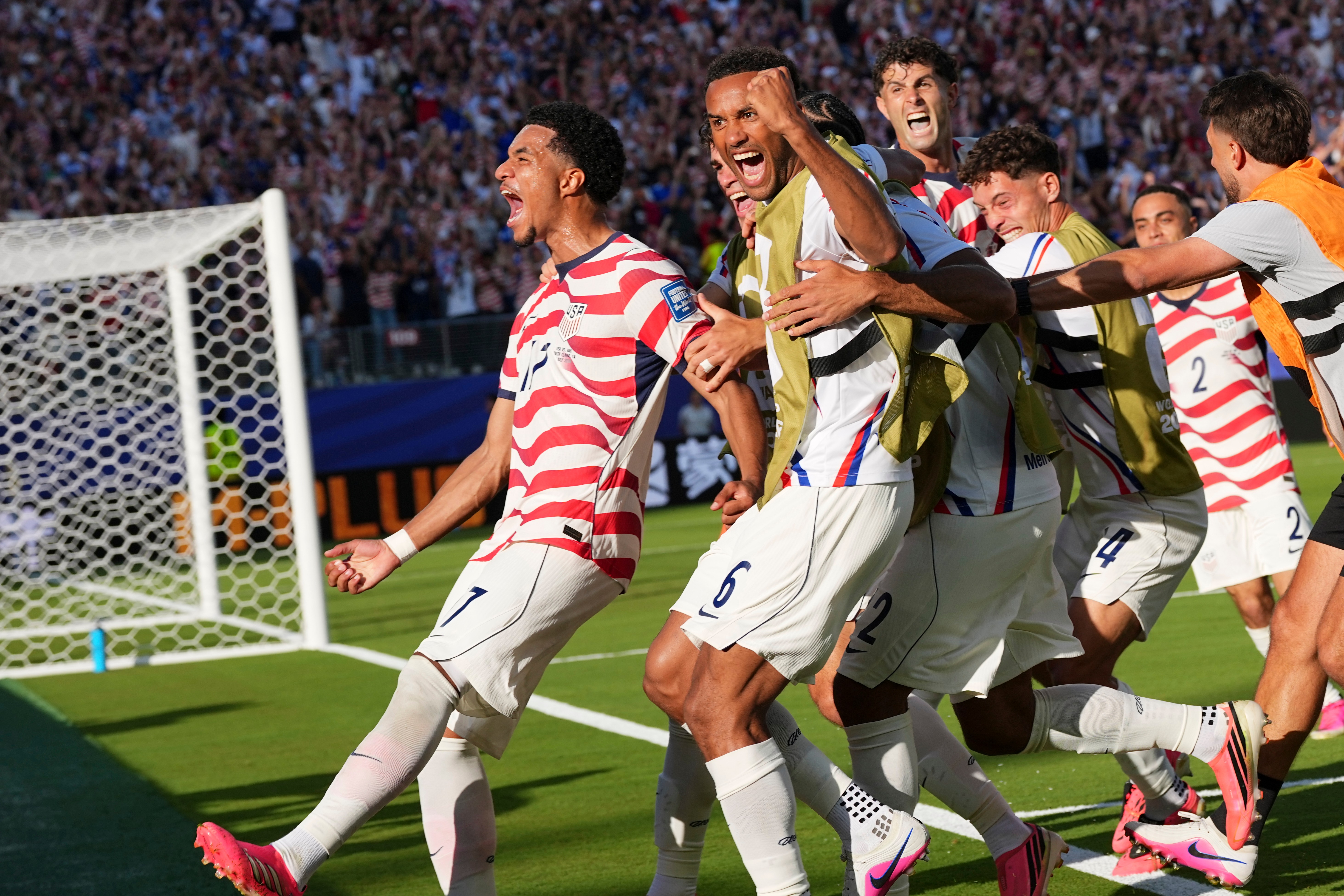 United States' Malik Tillman (17) celebrates with teammates after scoring on a free kick during the World Cup round of 32 soccer match between the United States and Bosnia in Santa Clara, Calif., near San Francisco, Wednesday, July 1, 2026. 