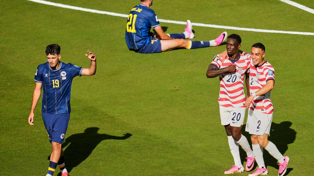 United States' Folarin Balogun (20) celebrates with Sergino Dest (2) after scoring their first goal as Bosnia's Kerim Alajbegovic (19) and Bosnia's Stjepan Radeljic (21) react during the World Cup round of 32 soccer match between the United States and Bosnia in Santa Clara, Calif., near San Francisco, Wednesday, July 1, 2026.