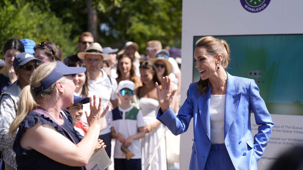 Britain's Kate, the Princess of Wales gestures during a visit on day four of the Wimbledon Tennis Championships in London, Thursday, July 2, 2026.