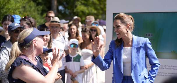 Princess Kate returns to Wimbledon and greets tennis fans lining up in the Queue