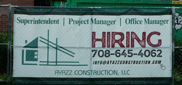 US filings for jobless aid fall to 215,000 as layoffs remain at historically healthy levels