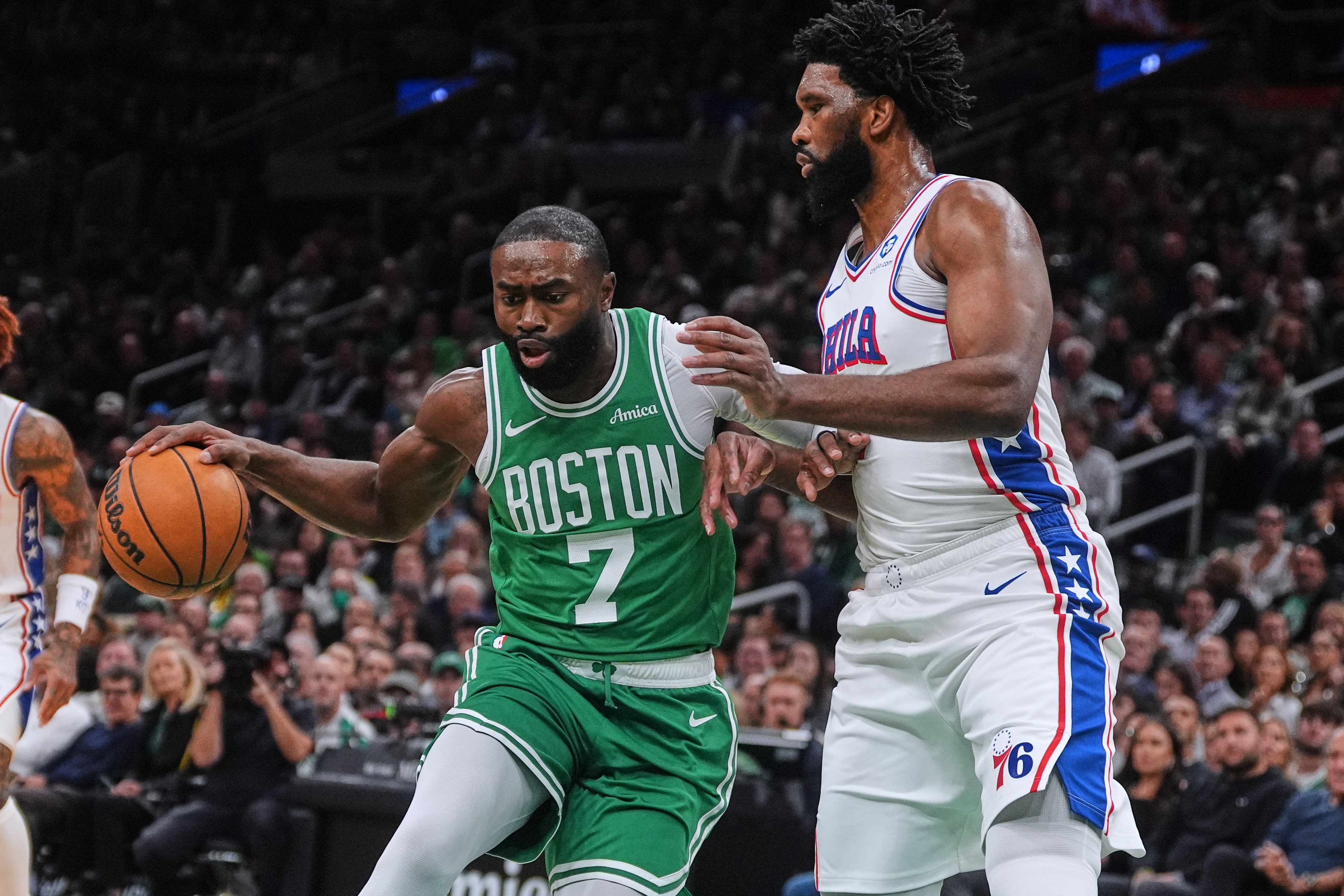 FILE - Boston Celtics forward Jaylen Brown (7) drives to the basket against Philadelphia 76ers center Joel Embiid, right, during the first half of an NBA basketball game, Wednesday, Oct. 22, 2025, in Boston. 