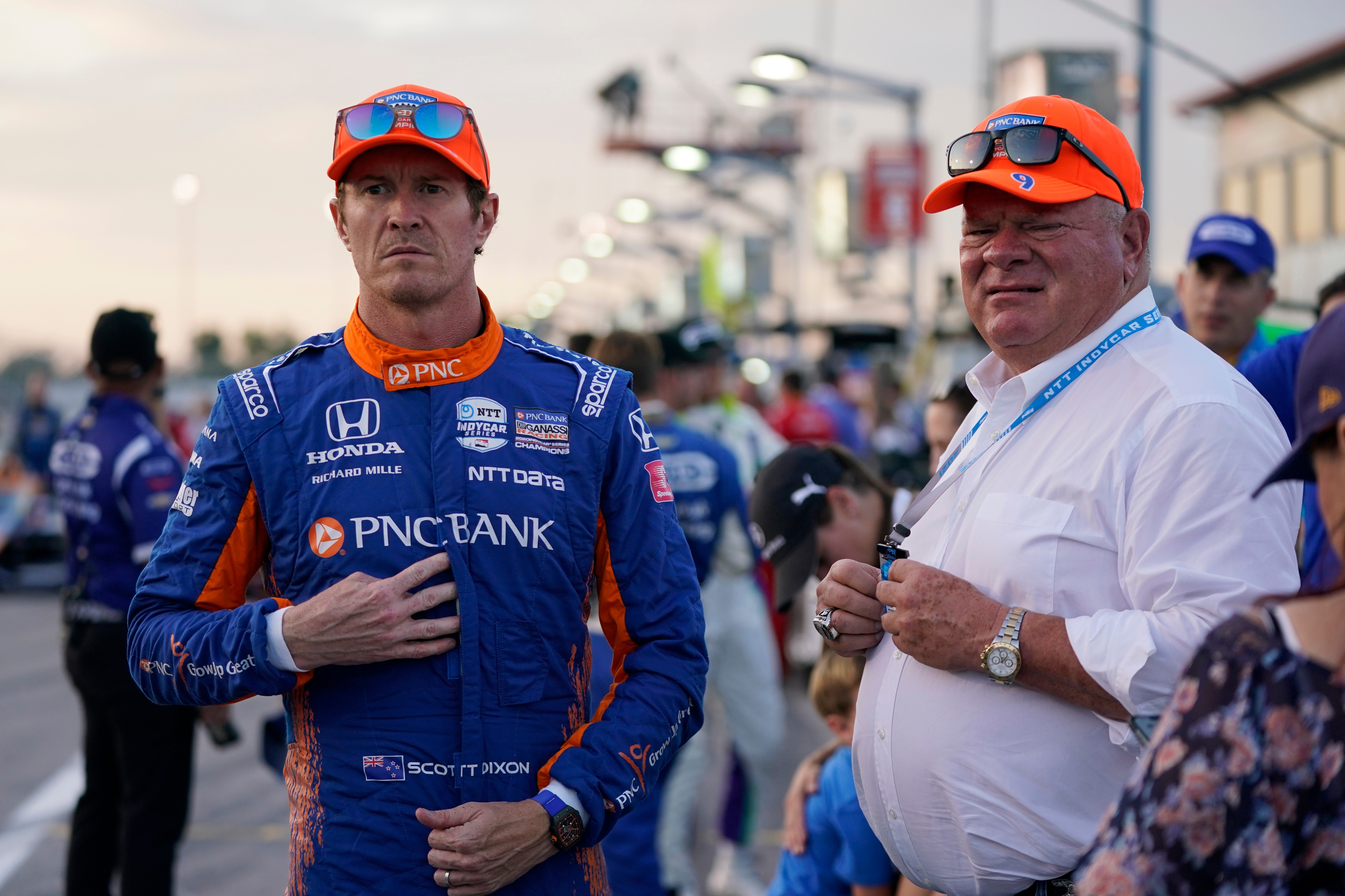 FILE - Scott Dixon, left, stands next to Chip Ganassi before the start an IndyCar auto race at World Wide Technology Raceway on Aug. 21, 2021, in Madison, Ill. 