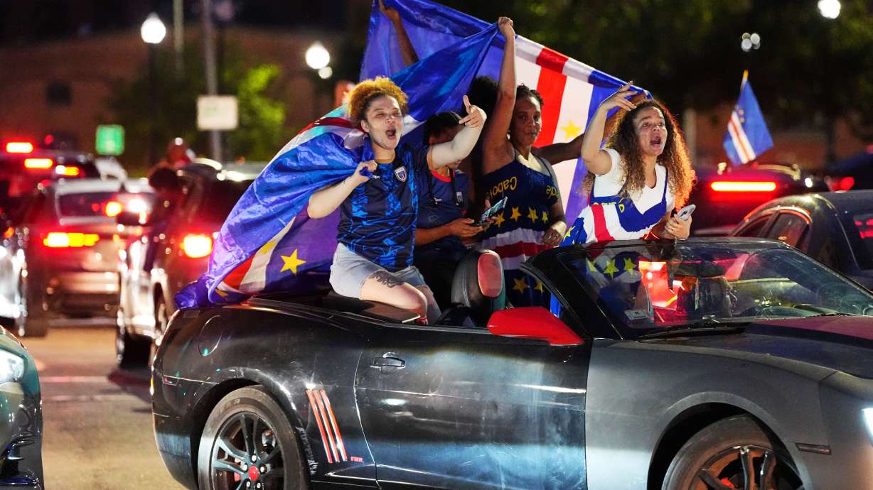 Cape Verde supporters celebrate in cars on the streets after the World Cup Group H soccer match between Uruguay and Cape Verde at the Cape Verde community in Brockton, Mass. near Boston, Sunday, June 21, 2026.