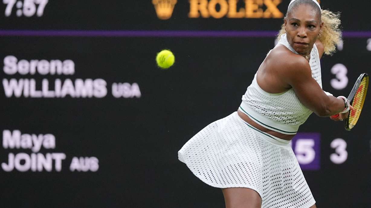 Serena Williams of the United States plays a backhand against Maya Joint of Australia in their first round women's singles match at the Wimbledon Tennis Championships in London, Tuesday, June 30, 2026.