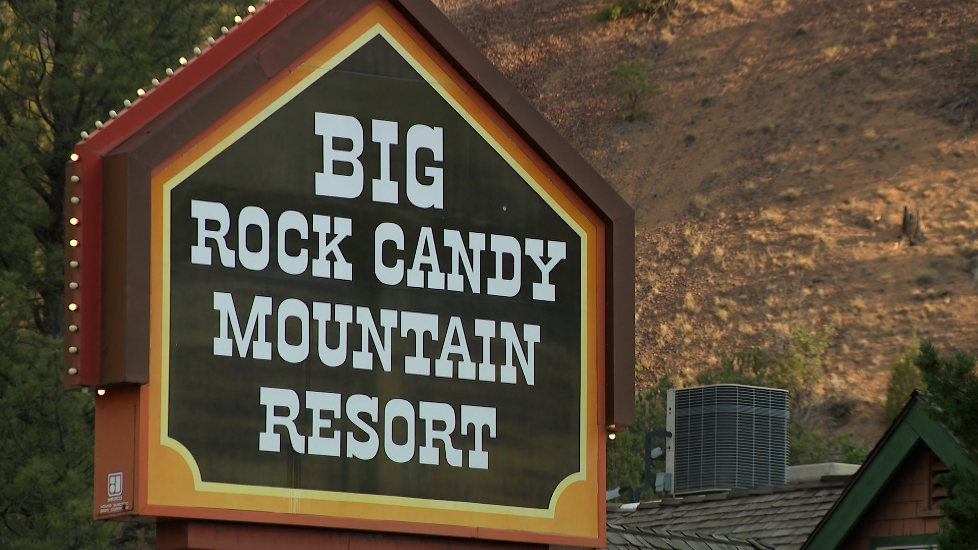 The Big Rock Candy Mountain Resort sign is pictured in Marysvale, Piute County. The Cottonwood Fire continues to burn on Beaver Mountain, but about 20 miles away in Marysvale, business owners say another struggle is unfolding.