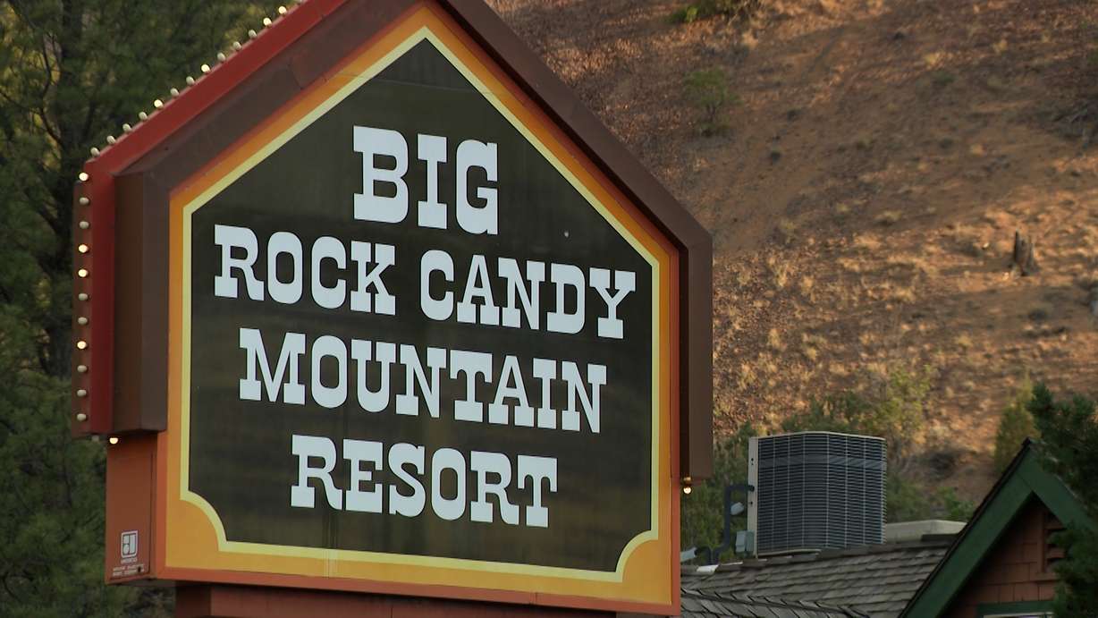 The Big Rock Candy Mountain Resort sign is pictured in Marysvale, Piute County. The Cottonwood Fire continues to burn on Beaver Mountain, but about 20 miles away in Marysvale, business owners say another struggle is unfolding.