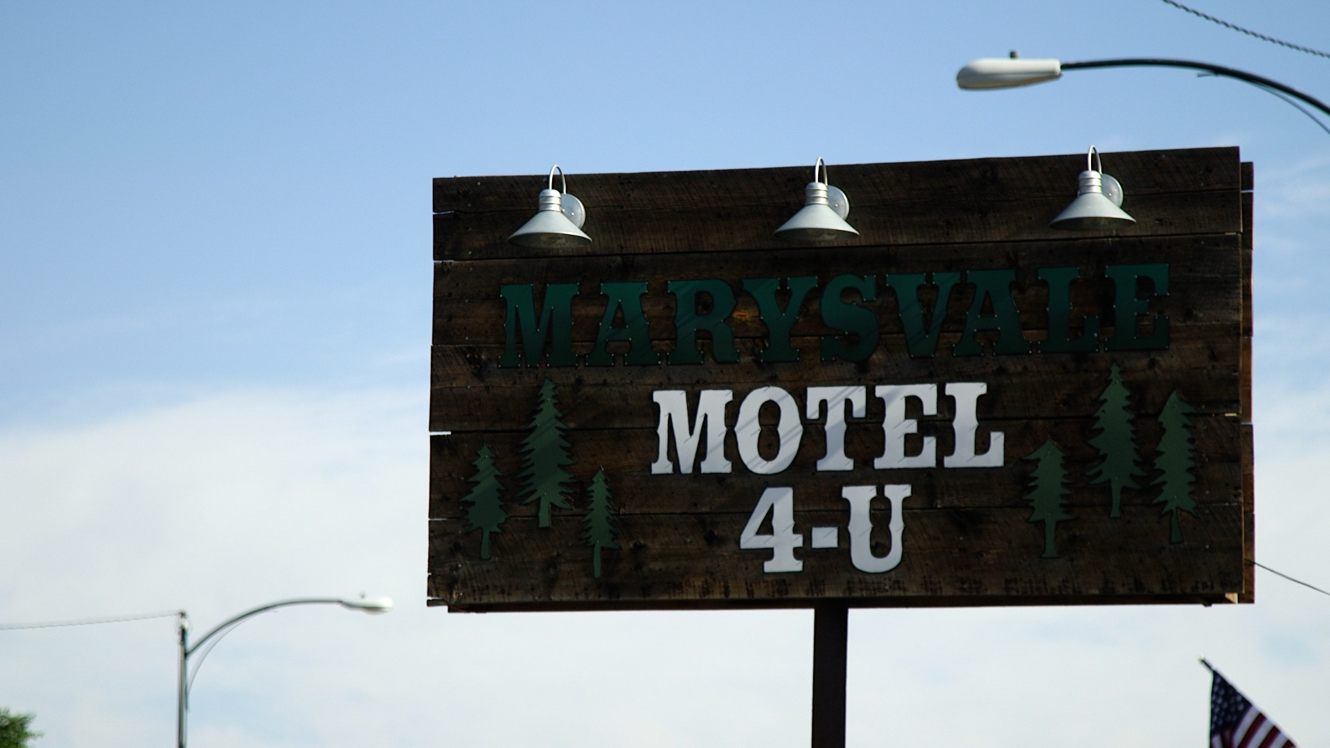 The Marysvale Motel 4-U sign is pictured. The Cottonwood Fire continues to burn on Beaver Mountain, but about 20 miles away in Marysvale, business owners say another struggle is unfolding.