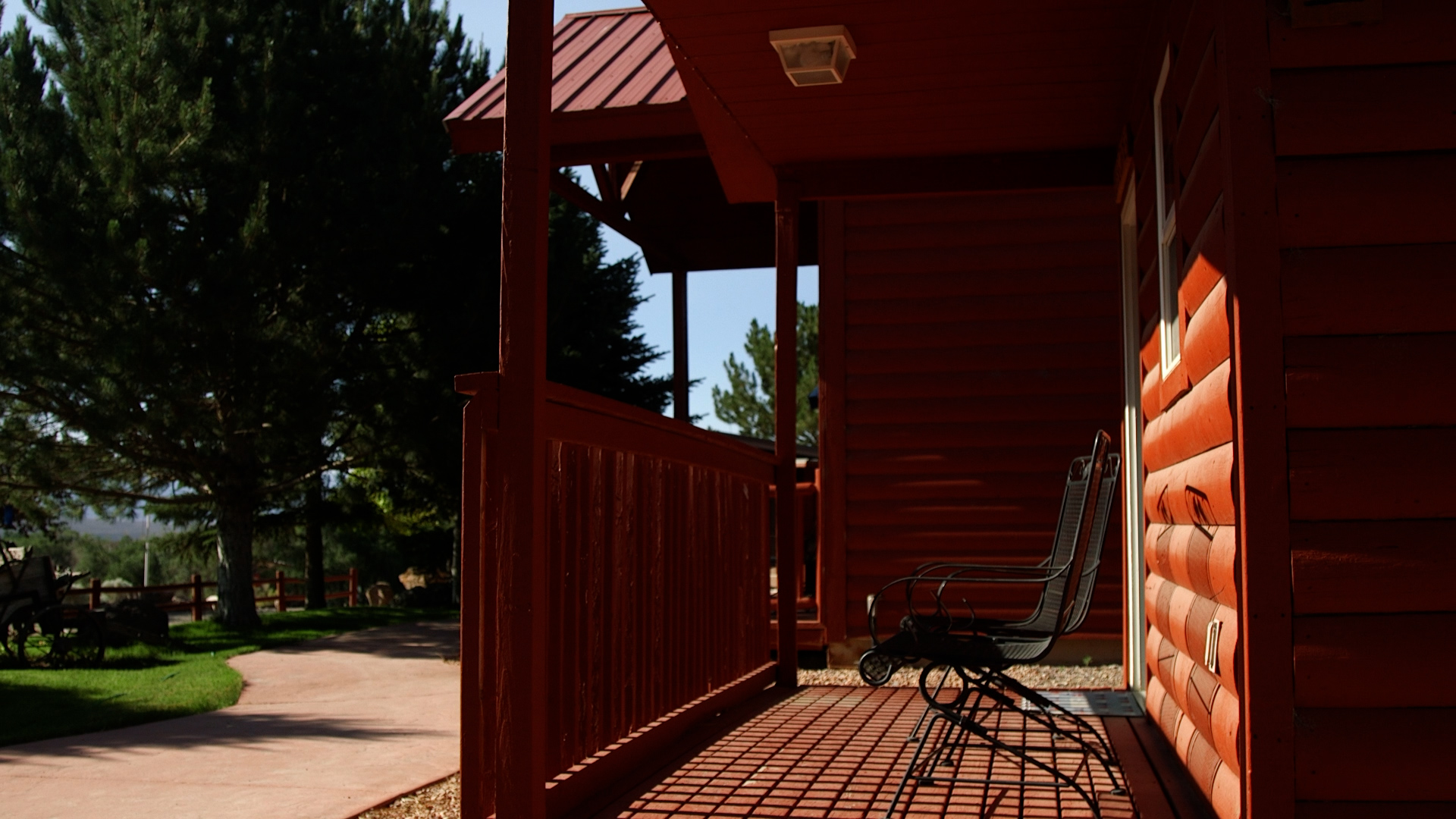 A Rocky Ridge Resort cabin porch is pictured. The Cottonwood Fire continues to burn on Beaver Mountain, but about 20 miles away in Marysvale, business owners say another struggle is unfolding.