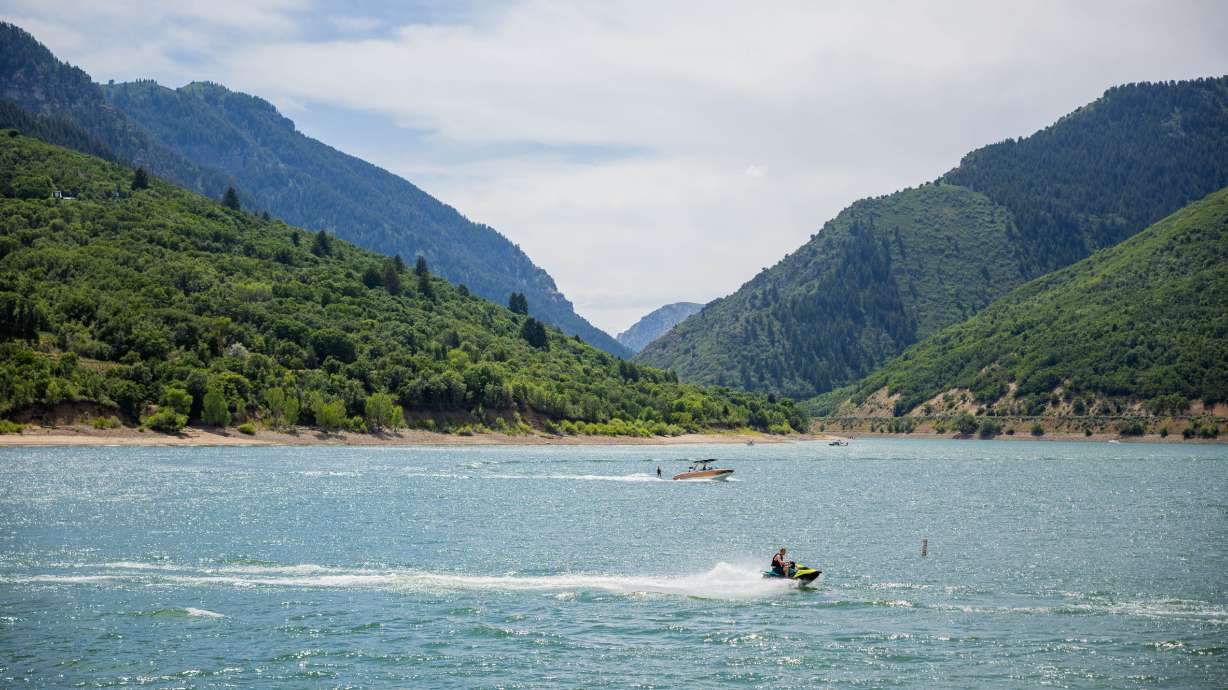 People recreate at Pineview Reservoir in Ogden Valley on Thursday. Utah's reservoir system has fallen to 64% capacity to start July, and is expected to drop amid drought and some construction projects, like one at the reservoir.