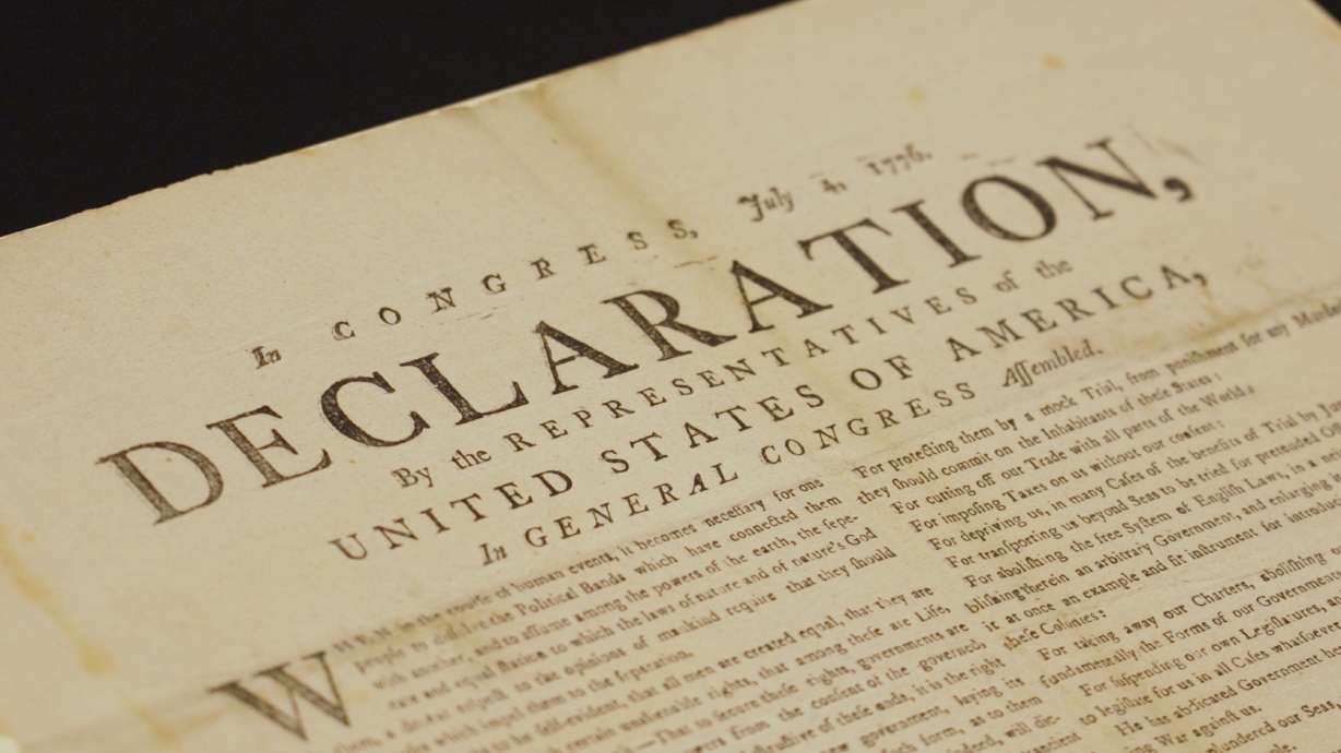 This image made from video shows a newly discovered copy of the U.S. Declaration of Independence, printed in July 1776 in Exeter, is displayed at The National Archives in London, Thursday.