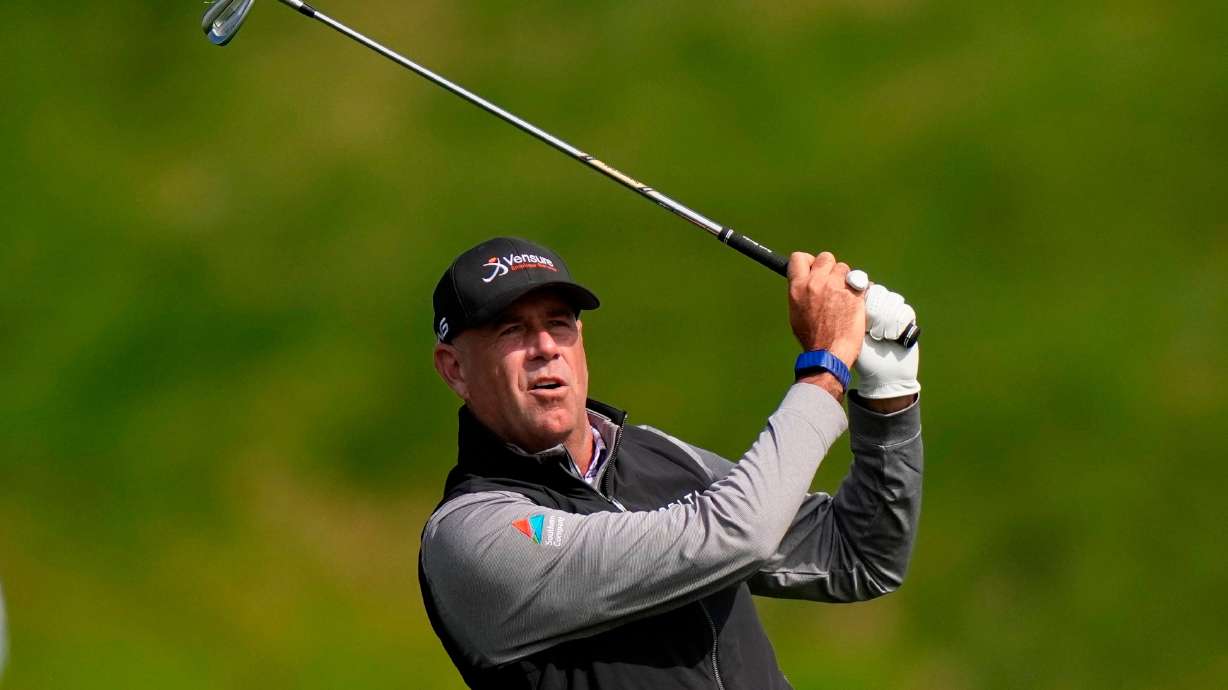 FILE - Stewart Cink hits from the first fairway during the second round of the PGA Championship golf tournament at Aronimink Golf Club May 15, 2026, in Newtown Square, PA.