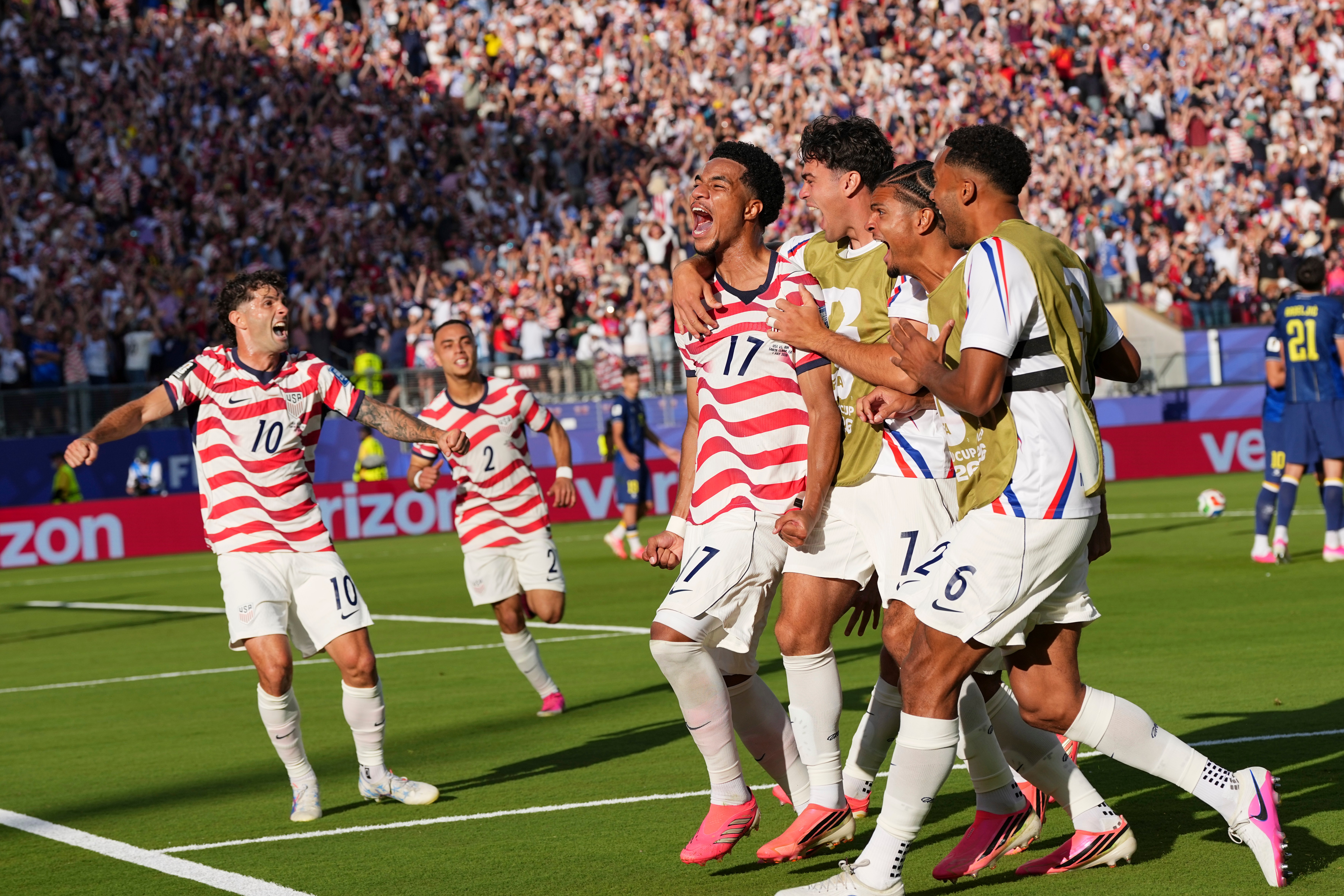 United States' Malik Tillman (17) celebrates with teammates after scoring on a free kick during the World Cup round of 32 soccer match between the United States and Bosnia in Santa Clara, Calif., near San Francisco, Wednesday, July 1, 2026. 