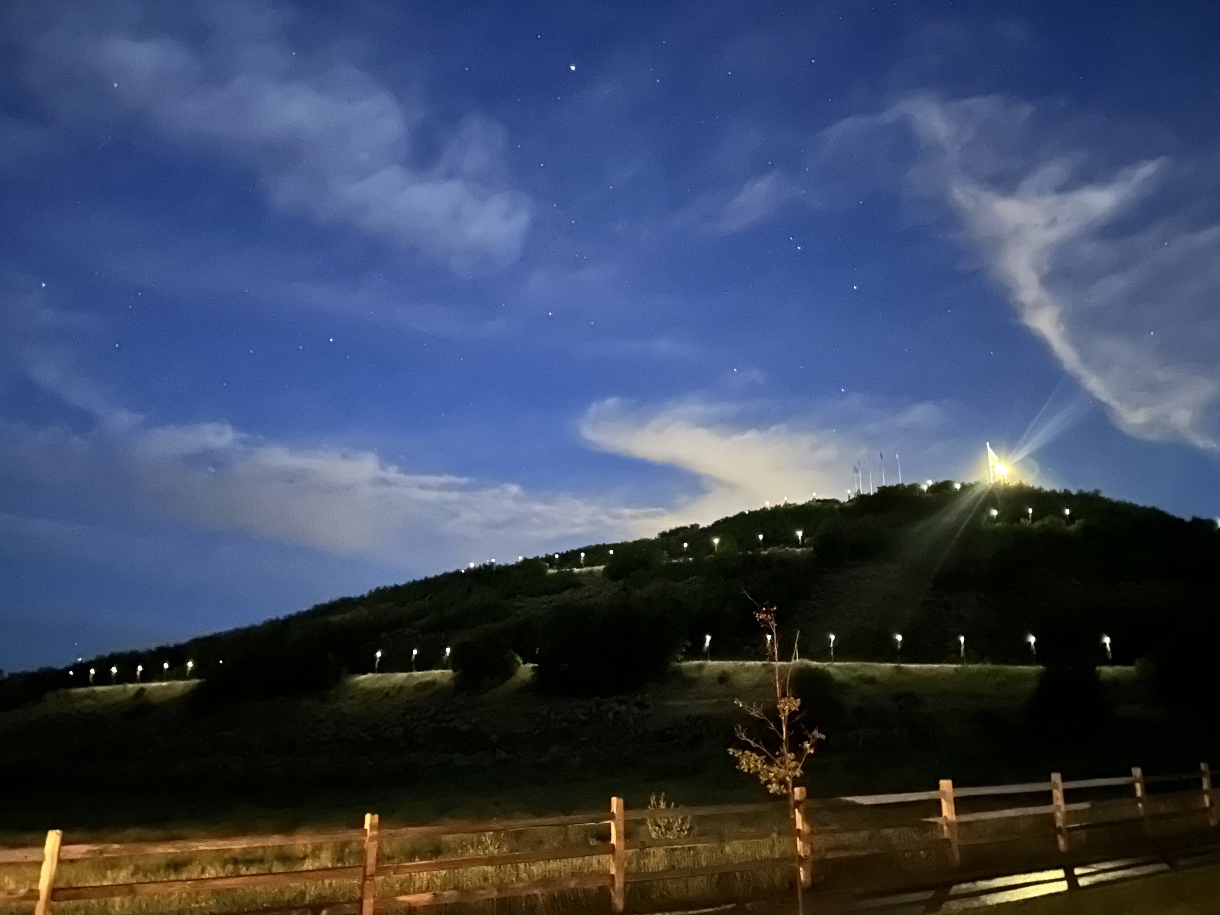 Commemorative America 250 flags light up the pathway to Memorial Hill in Midway.