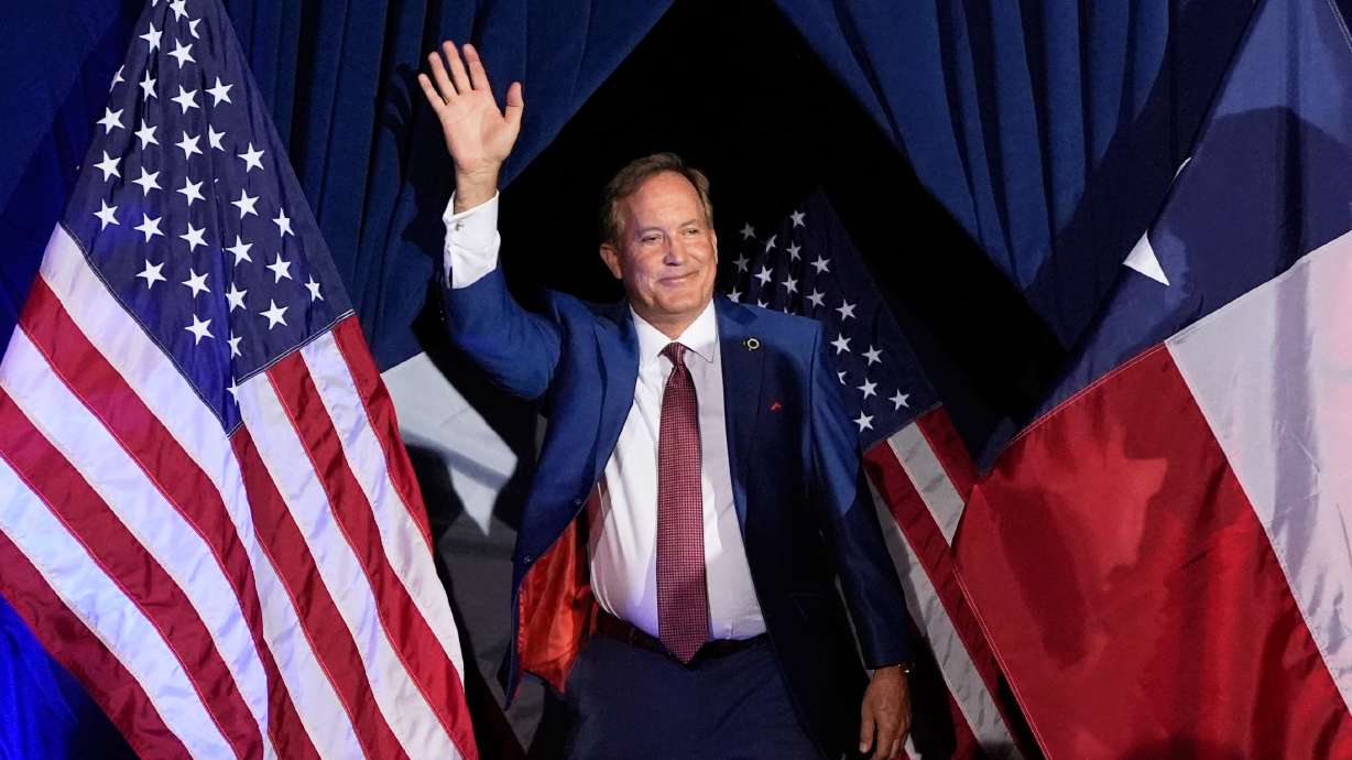 Texas Attorney General Ken Paxton, a Republican candidate for the U.S. Senate, waves as he takes the stage during a primary runoff election night event after winning the nomination, May 26, in Plano, Texas. Utah donors are organizing an August fundraiser for Paxton.