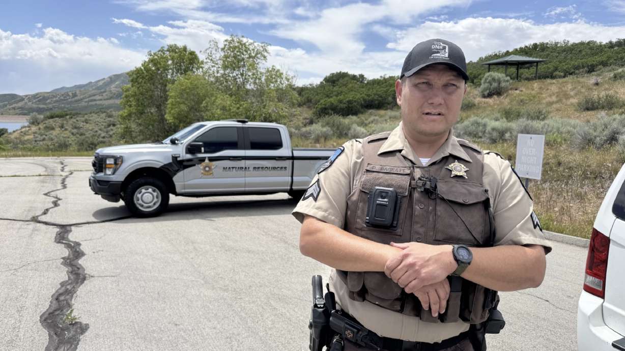 Utah Division of Natural Resources Sgt. Dominick Barratt discusses wildlife crimes near Little Dell Reservoir in Salt Lake County on Thursday.
