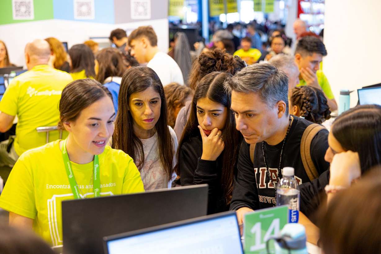 Guests work with a FamilySearch specialist to learn more about their ancestry. FamilySearch is offering an America 250 challenge to invite Americans to learn about their ancestors connected to the nation's history.