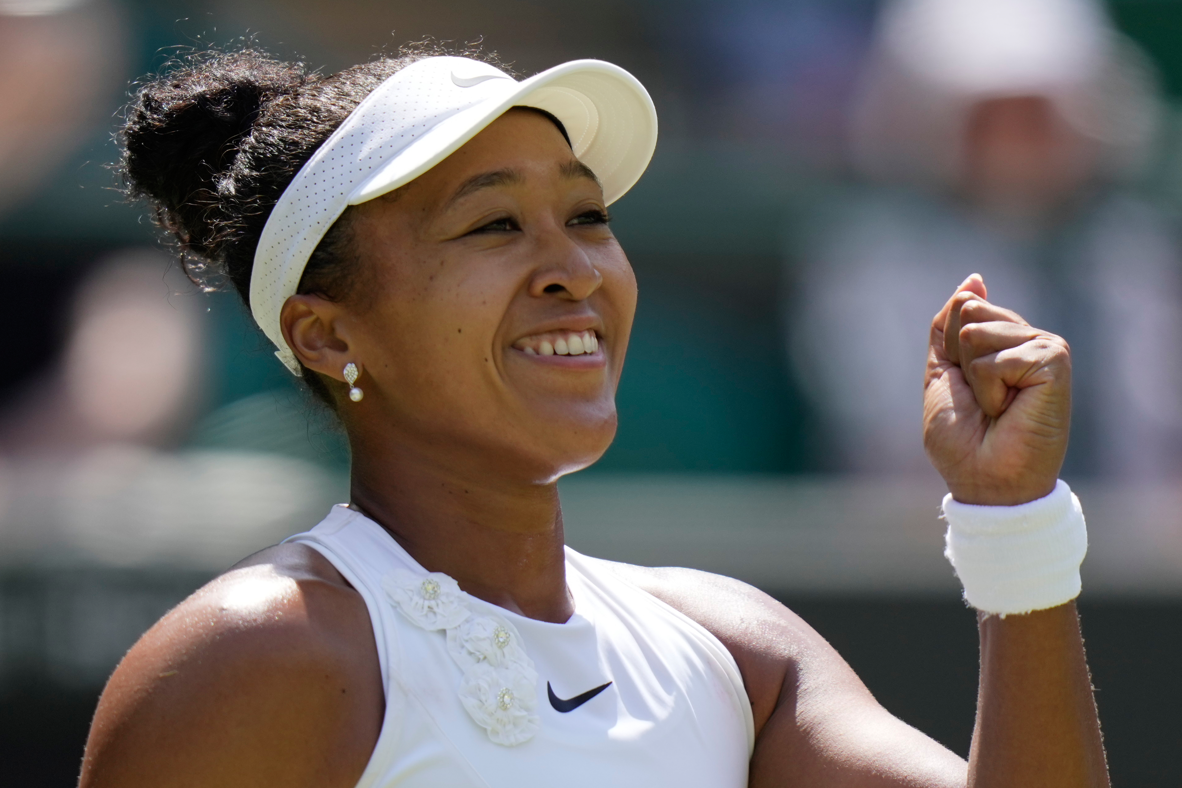 Naomi Osaka of Japan celebrates winning the third round women's singles match against Daria Kasatkina of Australia at the Wimbledon Tennis Championships in London, Friday, July 3, 2026.