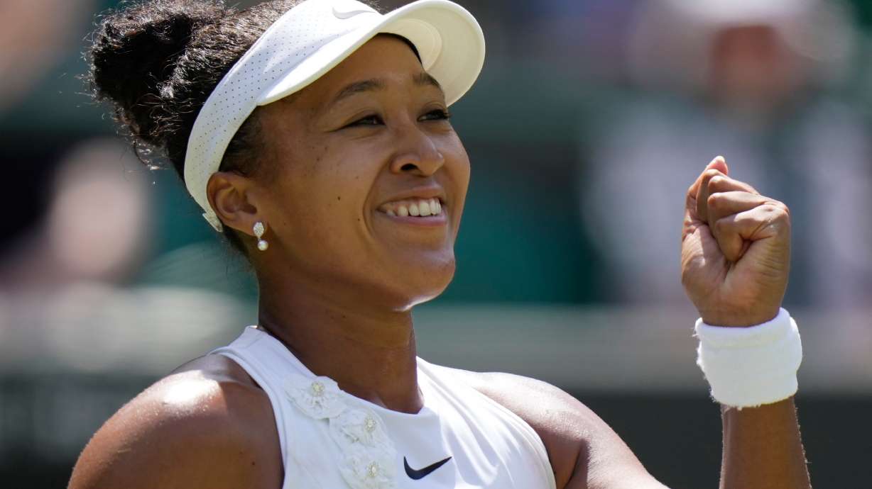 Naomi Osaka of Japan celebrates winning the third round women's singles match against Daria Kasatkina of Australia at the Wimbledon Tennis Championships in London, Friday, July 3, 2026.