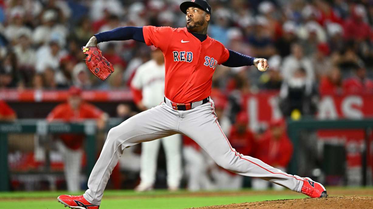 Boston Red Sox pitcher Aroldis Chapman delivers during the ninth inning of a baseball game against the Los Angeles Angels, Friday, July 3, 2026, in Anaheim, Calif.