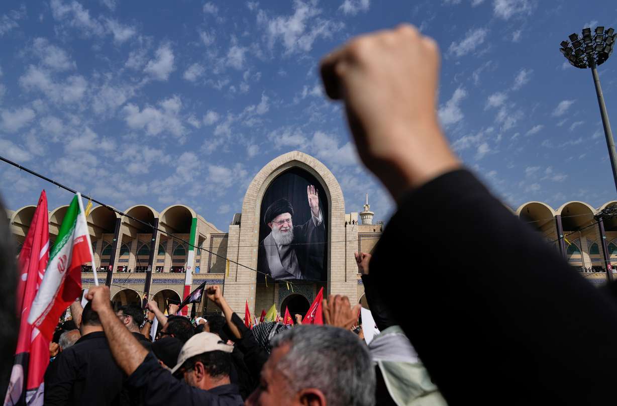 Mourners attend the start of the dayslong funeral ceremonies for slain Iranian Supreme Leader Ayatollah Ali Khamenei and members of his family at the Imam Khomeini Mosalla Grand Mosque in Tehran, Saturday. Mourners called for vengeance over Khamenei's death.