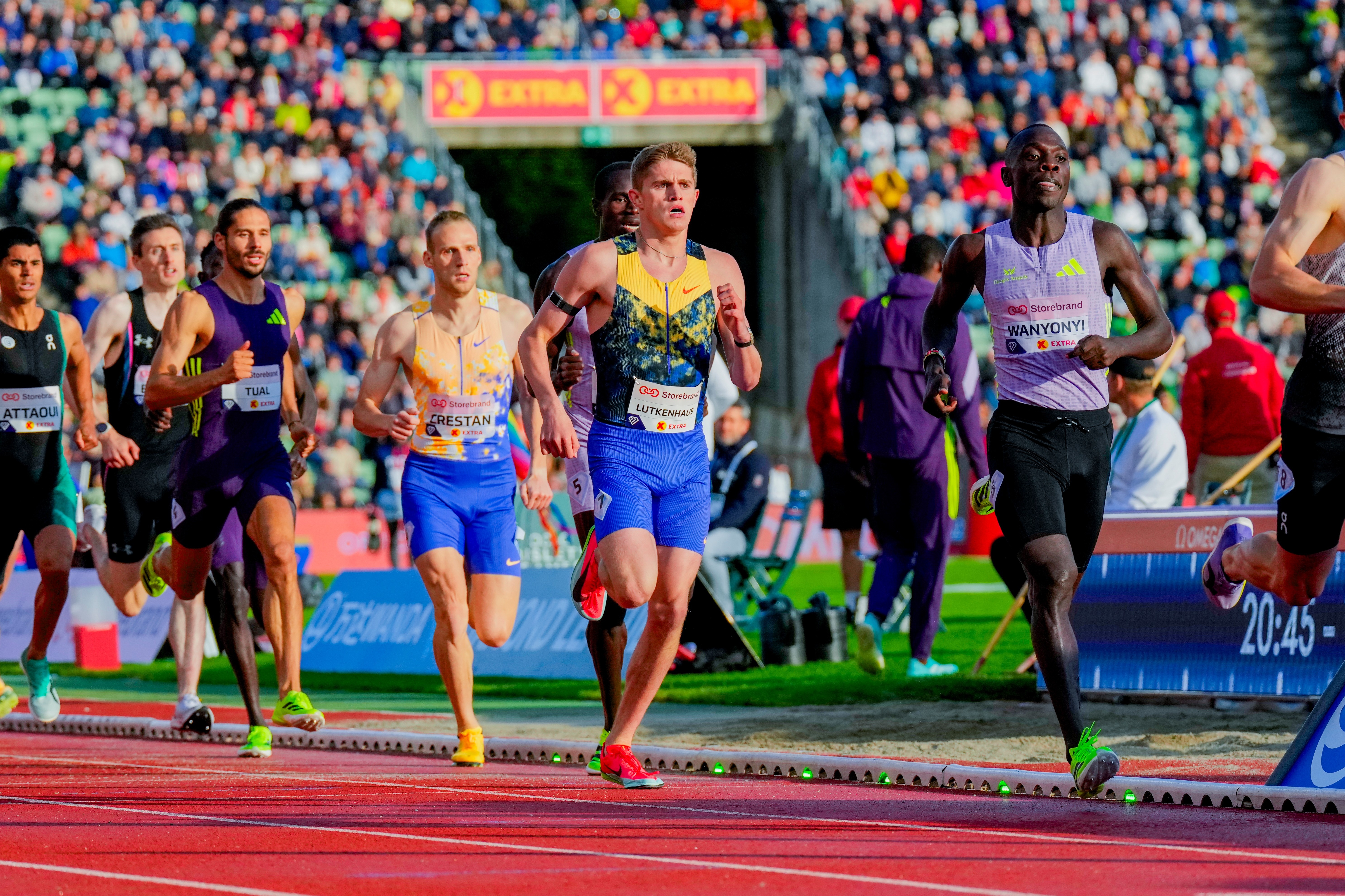 Brandon Miller storms past 17-year-old Cooper Lutkenhaus to win the 800 at Prefontaine Classic
