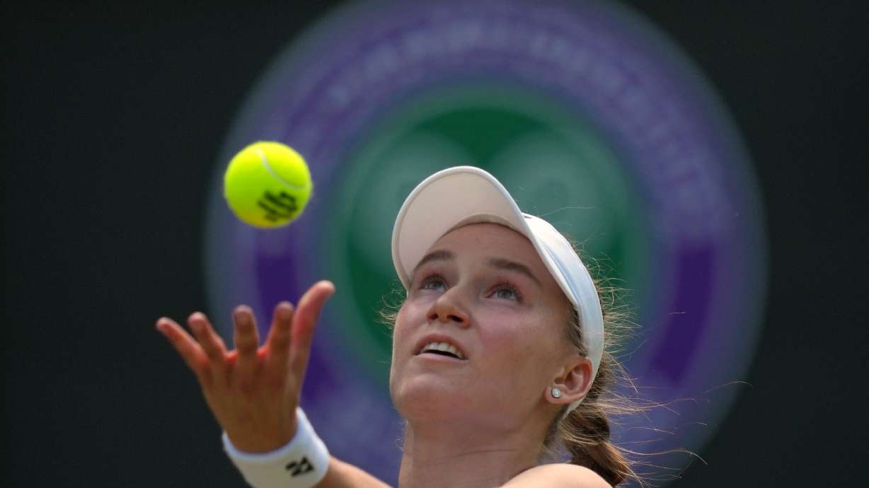 Elena Rybakina of Kazakhstan serves against Elise Mertens of Belgium in their third round women's singles match at the Wimbledon Tennis Championships in London, Saturday, July 4, 2026.