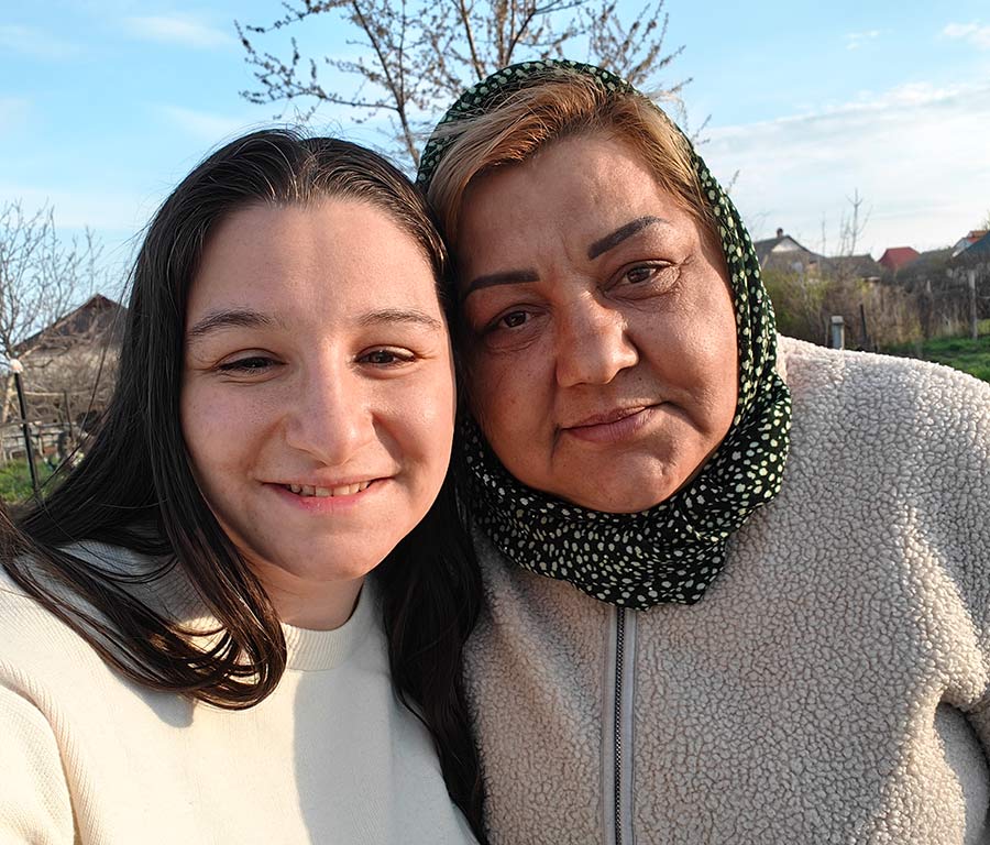 McKenna Christensen with her biological sister in Moldova. Christensen finally saw her family for the first time in over 30 years.