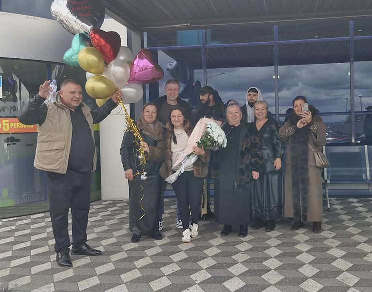 McKenna Christensen’s family picking her up from the airport after meeting for the first time in Chisinau, Moldova. Christensen is planning to return more often in the future.