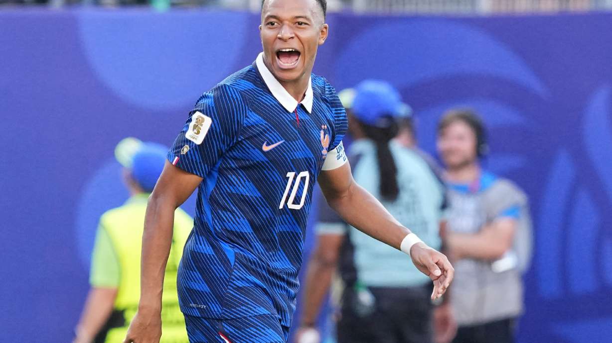 France's Kylian Mbappe (10) celebrates after scoring from a penalty kick the opening goal during the World Cup round of 16 soccer match between Paraguay and France in Philadelphia, Saturday, July 4, 2026.