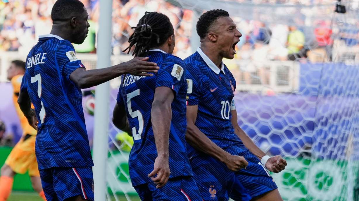 France's Kylian Mbappe celebrates after scoring from the penalty spot the opening goal during the World Cup round of 16 soccer match between Paraguay and France in Philadelphia, Saturday, July 4, 2026.