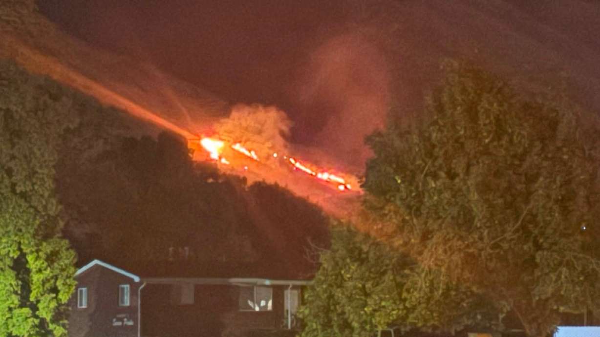 A large brush fire burns near Slate Canyon in Provo Saturday night.