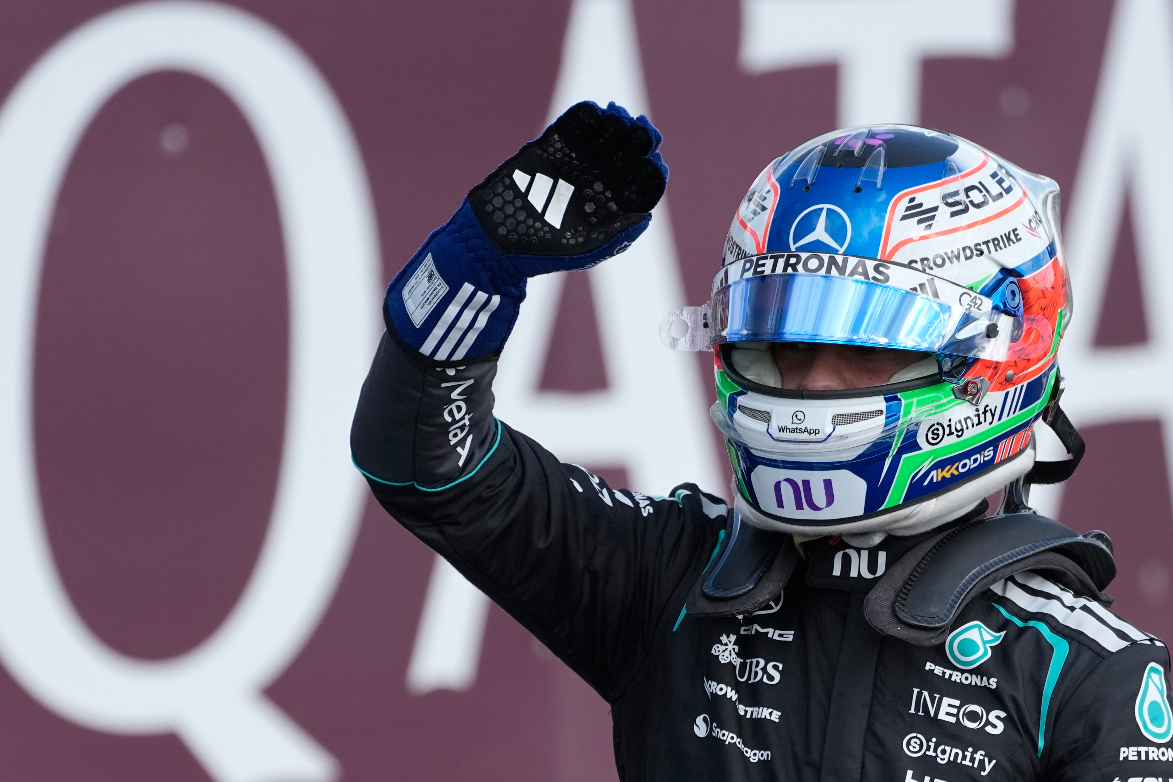 Mercedes driver Andrea Kimi Antonelli of Italy celebrates after clocked the fastest time during the qualifying session ahead of the British F1 Grand Prix, in Silverstone, England, Saturday, July 4, 2026. 