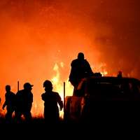 Wildfires rage in Portugal, Greece and Spain while Greek authorities warn of toxic smoke