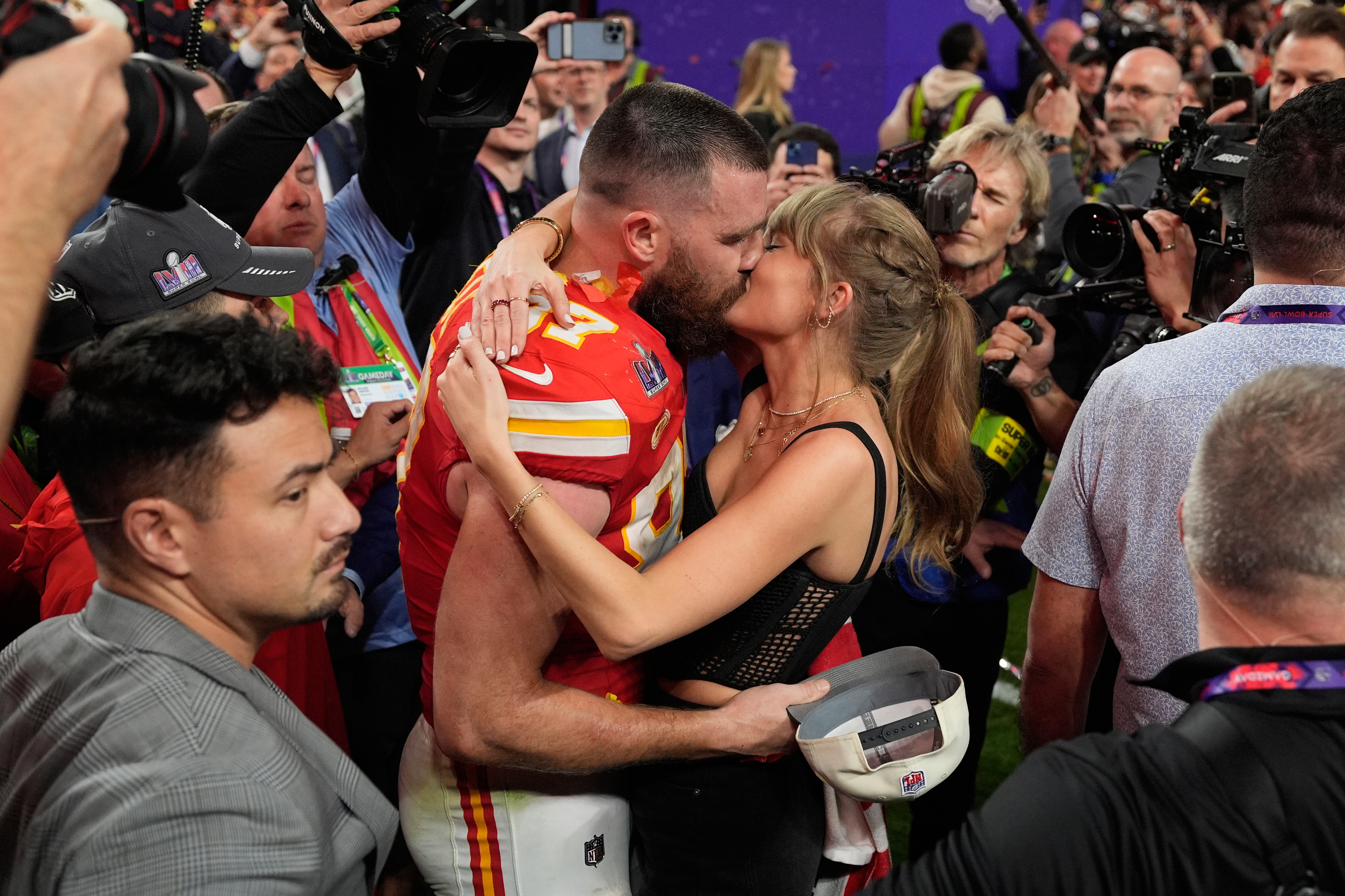 FILE - Kansas City Chiefs tight end Travis Kelce (87) kisses Taylor Swift after the Kansas City Chiefs defeated the San Francisco 49ers at the Super Bowl in Las Vegas on Feb. 11, 2024. 