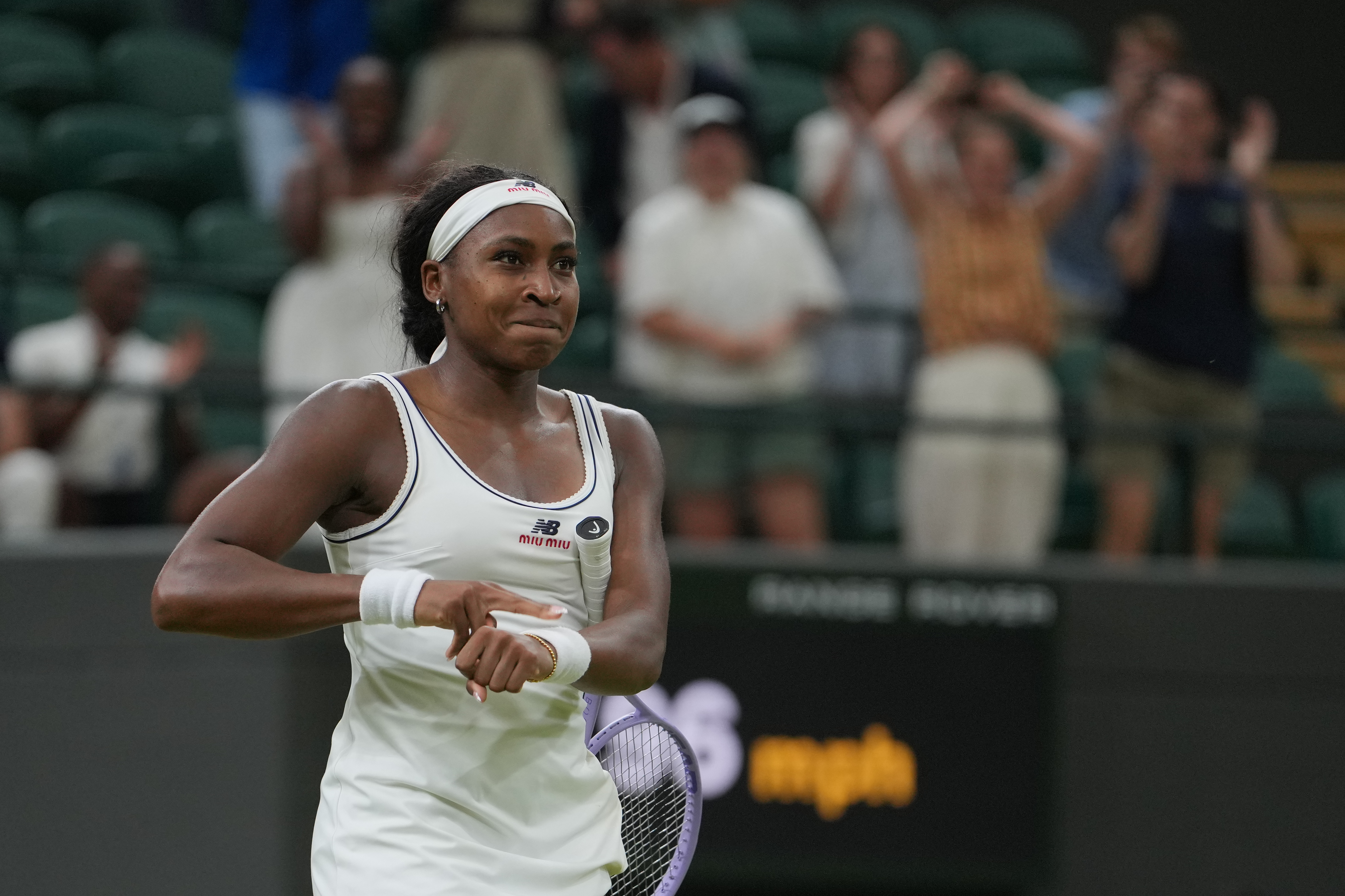 Coco Gauff of the United States reacts after winning against Belinda Bencic of Switzerland in their fourth round women's singles match at the Wimbledon Tennis Championships in London, Sunday, July 5, 2026. 
