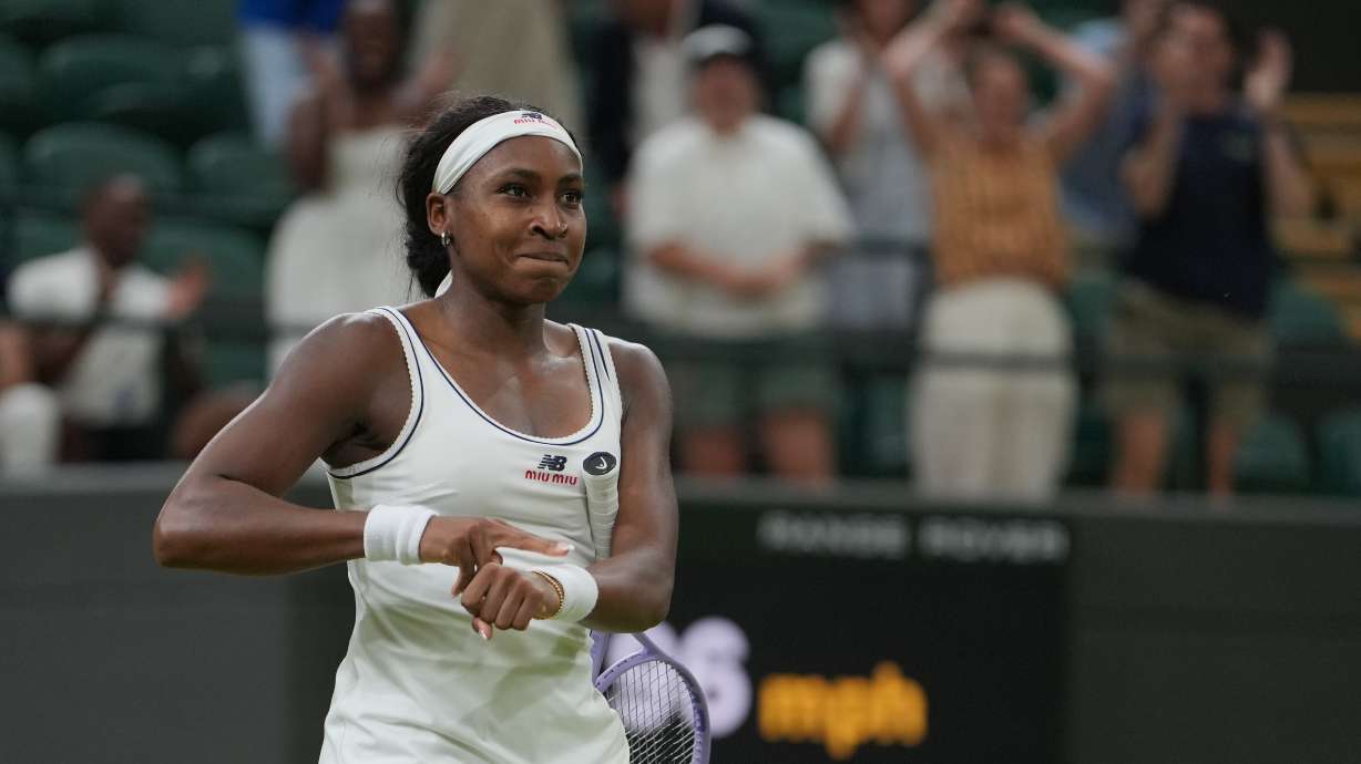 Coco Gauff of the United States reacts after winning against Belinda Bencic of Switzerland in their fourth round women's singles match at the Wimbledon Tennis Championships in London, Sunday, July 5, 2026.