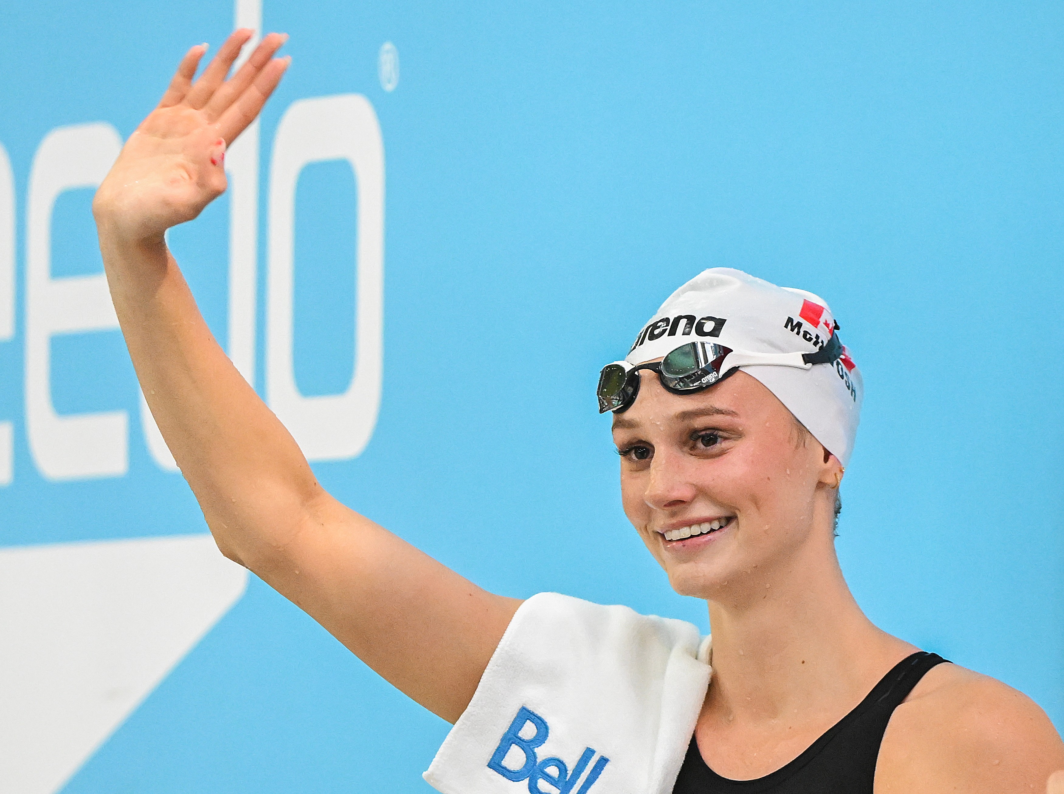Summer McIntosh waves to fans after setting a new world in the women's 200m butterfly final at the Canadian Swimming Trials in Montreal, on Sunday, July 5, 2026. 