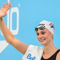 Summer McIntosh breaks women's 200-meter butterfly world record at Canadian trials
