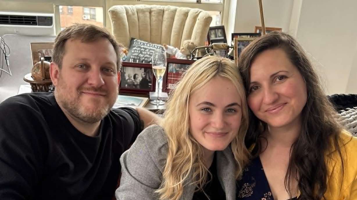 Audrey with her parents Chad and Kiirstin Coronato.