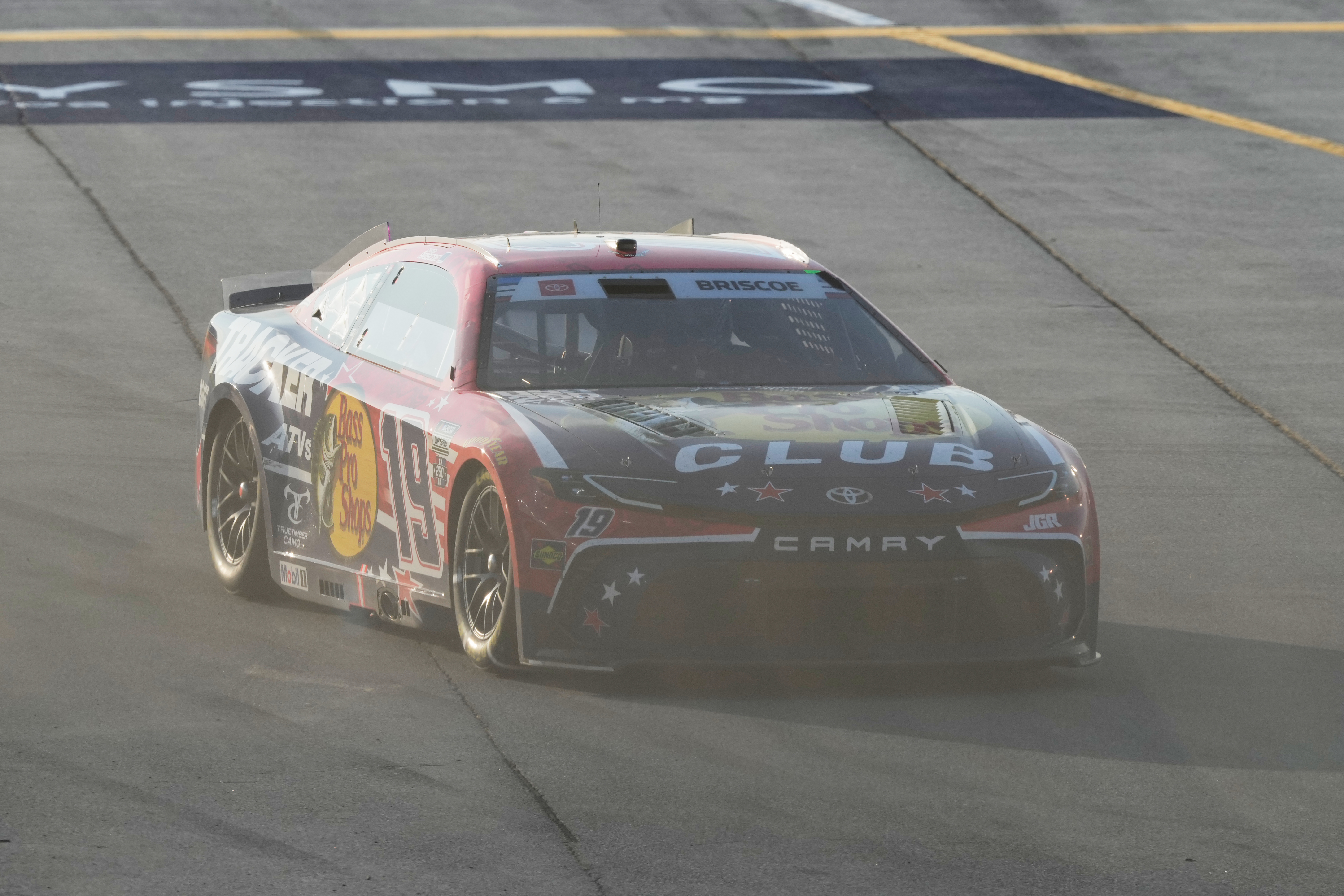 Chase Briscoe (19) drives to the track after making a pit stop during a NASCAR Cup Series auto race at Chicagoland Speedway in Joliet, Ill., Sunday, July 5, 2026. 