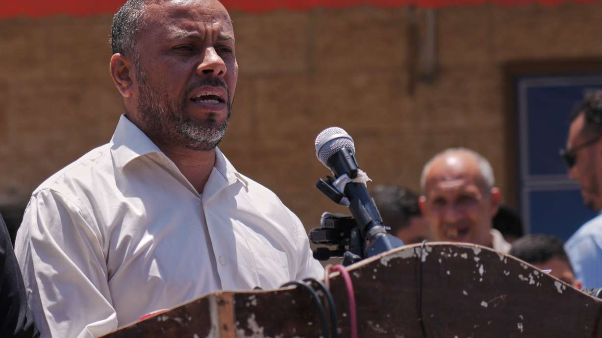 Ismail al-Thawabta, general director of the Hamas-run government media office, speaks at Al-Aqsa Hospital in Deir al-Balah, central Gaza Strip, Monday. Hamas says it has dissolved its government in Gaza and is preparing to transfer power.