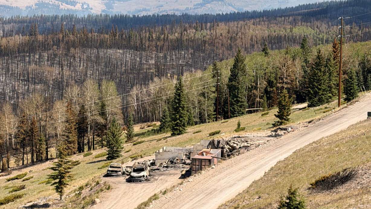 Charred remains of houses and vehicles are all that is left in Eagle Point Resort’s West Village outside of Beaver Tuesday, June 30, 2026, after the Cottonwood Fire torched much of the area.