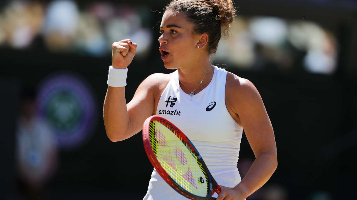 Jasmine Paolini of Italy reacts during the women's singles fourth round match against Alexandra Eala of the Philippines at the Wimbledon Tennis Championships in London, Monday, July 6, 2026.