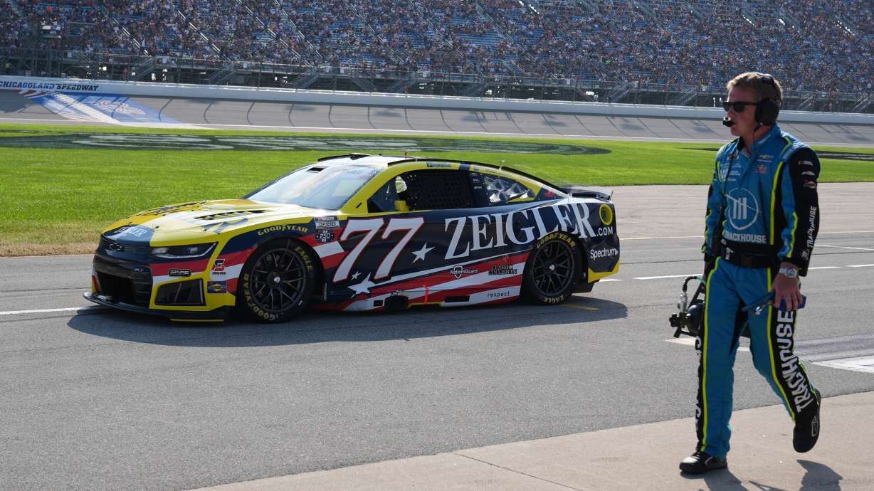 Carson Hocevar (77) drives to the track during a NASCAR Cup Series auto race at Chicagoland Speedway in Joliet, Ill., Sunday, July 5, 2026.